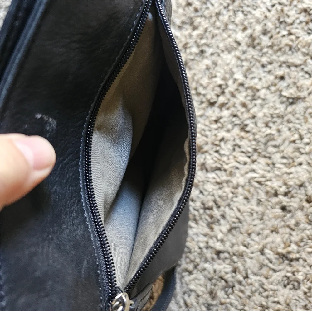 Margot black leather crossbody bag with corner pocket on‎ a front